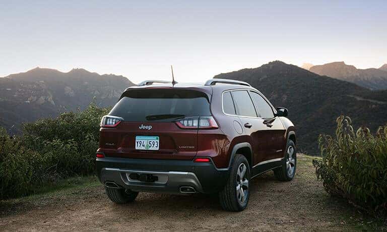 2022 Jeep Cherokee Exterior Parked On A Cliff Against Some Mountains