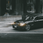 BMW turning around the corner in a urban setting