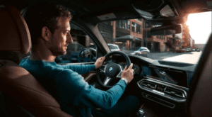 Interior shot of man driving 2021 BMX X5