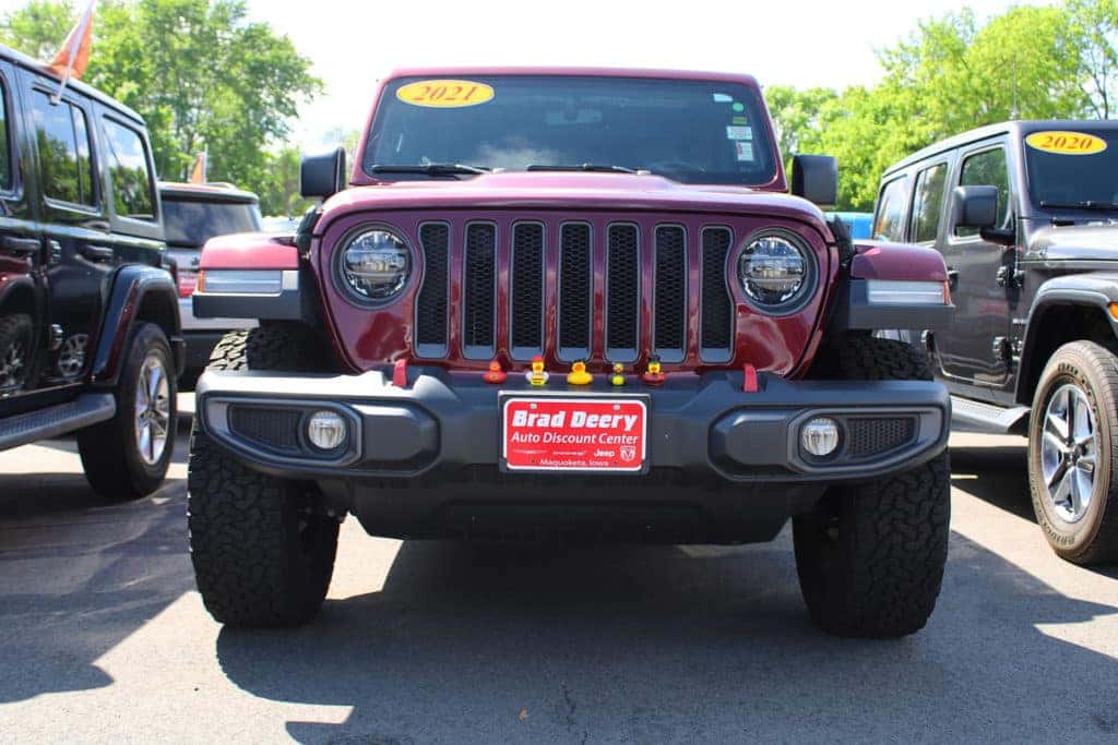 Jeep Wrangler with rubber duckies on the bumper