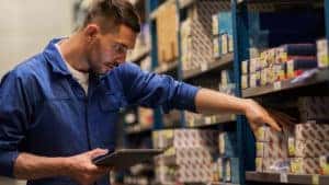 Parts person looking at parts