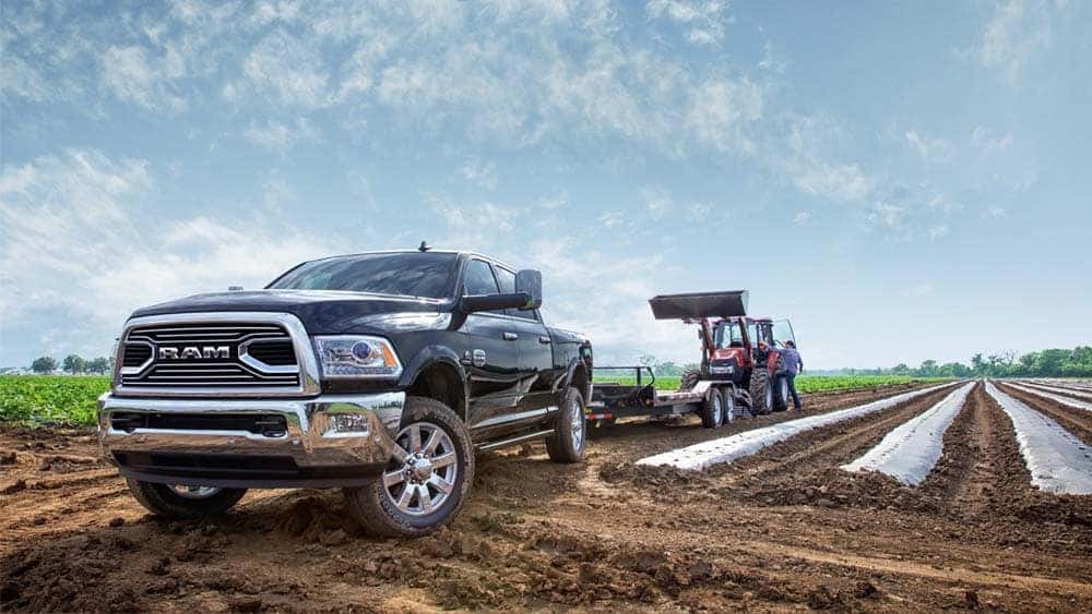 2018 Ram 2500 Laramie Longhorn towing tractor