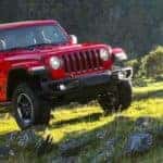 2019 red wrangler in open field
