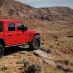 Red 2020 Jeep Gladiator Parked On Rocks