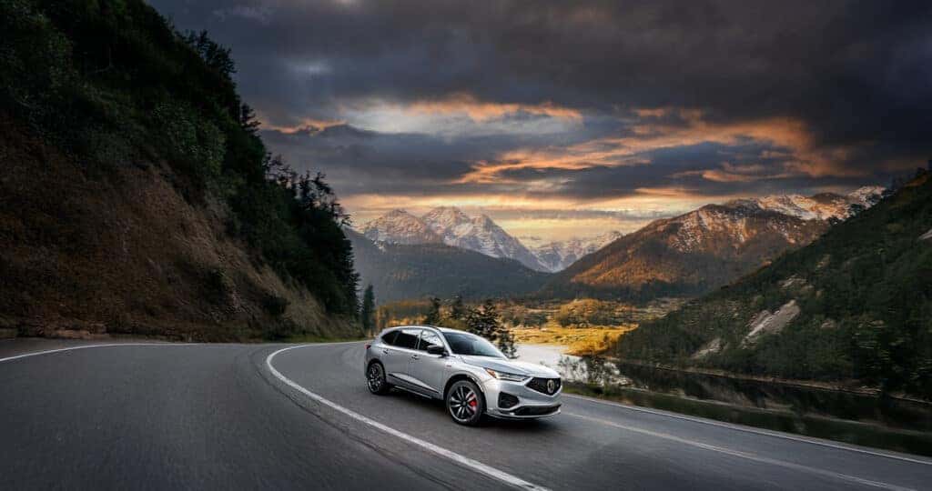 2025-Acura-MDX-Type-S-driving-through-the-mountains-at-sunset