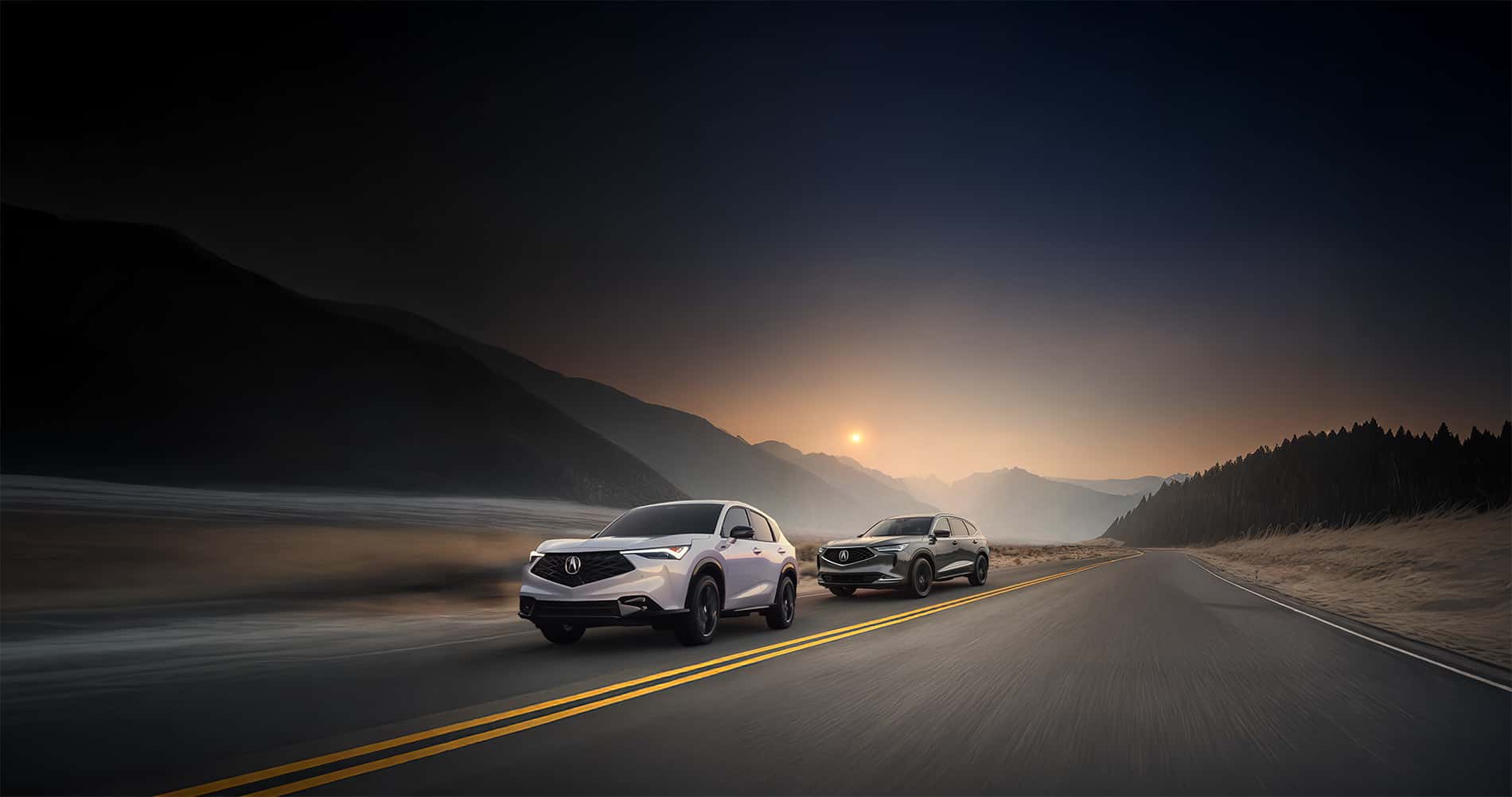 Acura ADX vs Acura MDX driving through a mountain valley at sunset