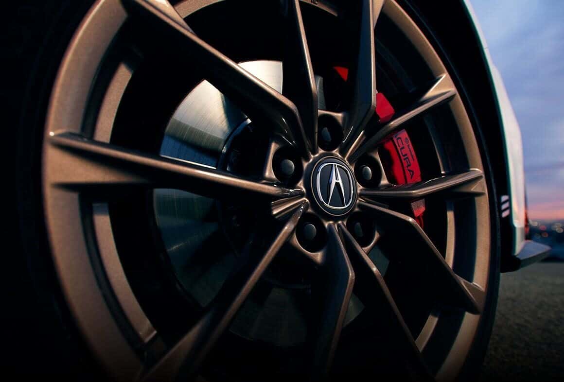 19-inch Shark Gray alloy wheel and red Brembo four-piston front brake caliper on the 2026 Acura Integra Type S