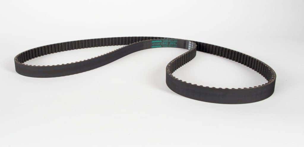 A genuine Acura timing belt shown on a plain background