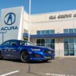 Acura sedan parked outside the Elk Grove Acura showroom, a short drive from West Sacramento