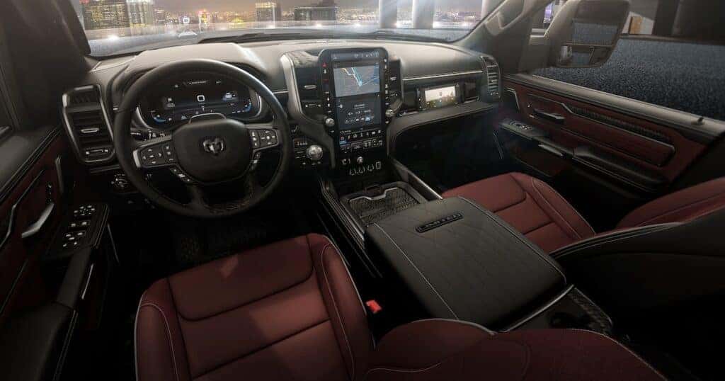 2025 RAM 1500 Ramcharger in interior view at night with Sacramento view in windshield