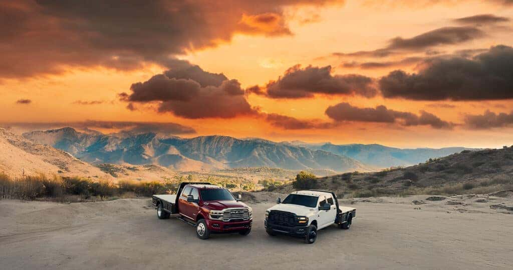 2026 RAM chassis cab trims parked next to each other infront of a mountain sunset