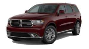 A red 2020 Dodge Durango is facing left.