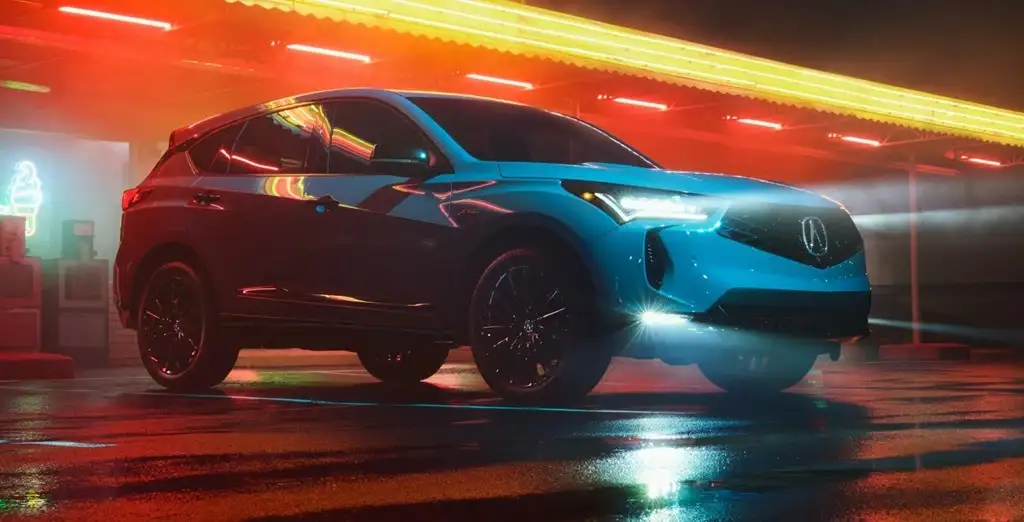 2025 Acura RDX showcasing its frameless Diamond Pentagon grille and Jewel Eye LED headlights.