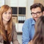 Couple at Desk meeting broker