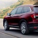 2020 Honda Pilot driving on highway in the mountains
