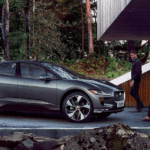 Man and woman walking to parked I-PACE