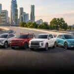 2026 Hyundai SUV models including Kona, Tucson, Santa Fe, Palisade, IONIQ 5, and IONIQ 9 driving together on open road