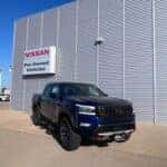 blue nissan frontier truck parked on a dealership lot in cape girardeau mo