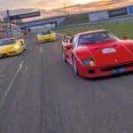 Ferrari models racing on a track