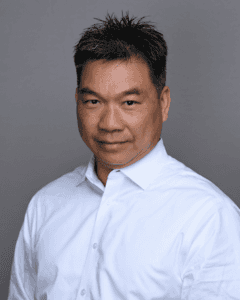 RICKY TRAN