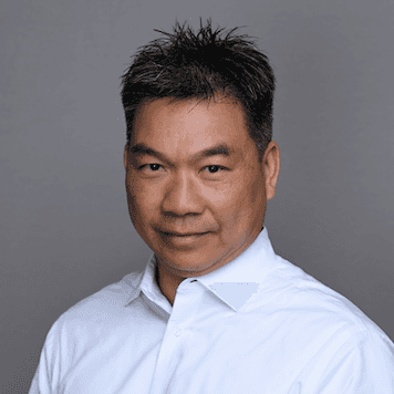 RICKY TRAN