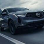 2026 Acura RDX driving on a roadway