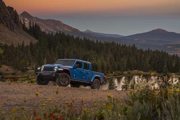 Blue Jeep Gladiator Mojave X in the mountains
