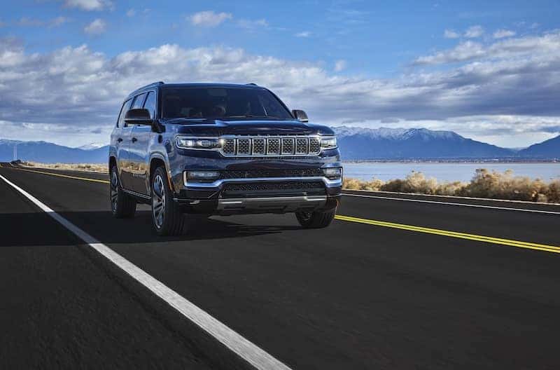 2025 Jeep Grand Wagoneer driving down the road