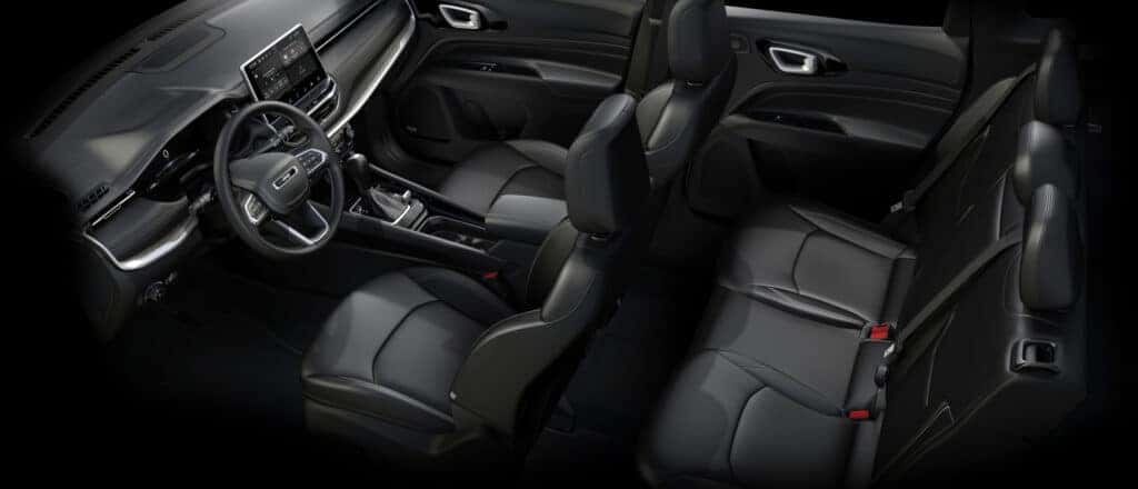 The interior of the 2025 Jeep Compass showing comfortable black leather seating.