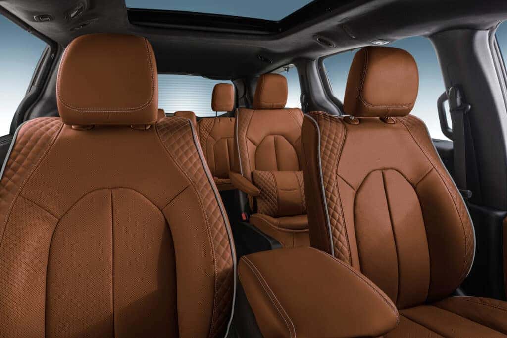 Brown leather seating in the interior of the 2025 Chrysler Pacifica.