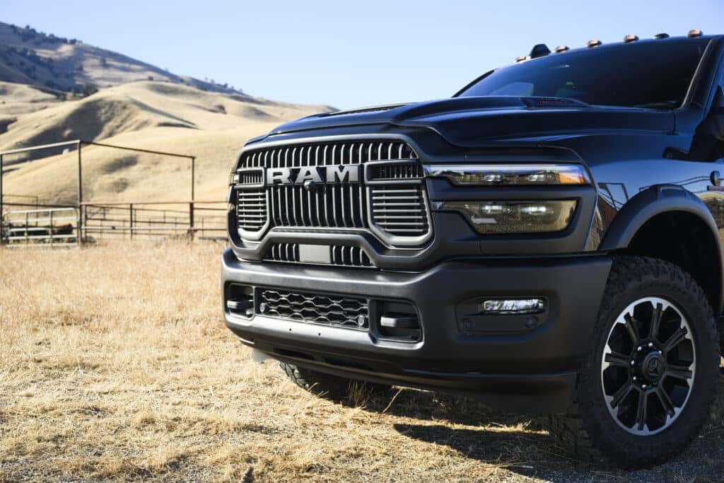 The front of a blue 2025 Ram 3500 heavy duty truck.