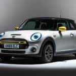 2020 MINI SE under a spotlight with a dark grey background.