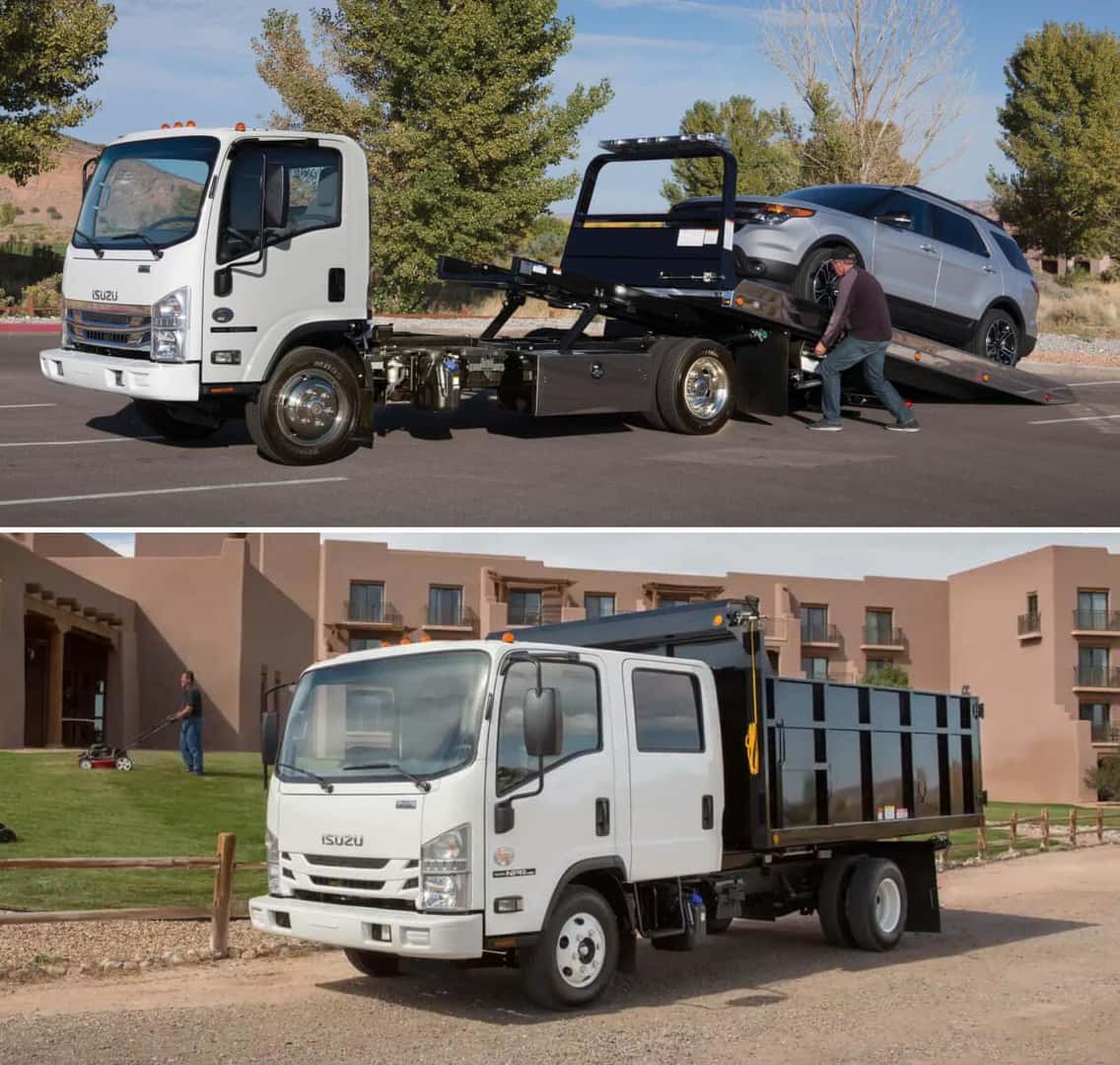 An Isuzu NPR flatbed towing an SUV. Another NPR dump truck parked in front of an apartment building.