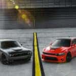 High performance red and grey 2019 Dodge cars separated by a yellow line