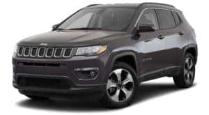 A grey 2020 Jeep Compass is facing left.