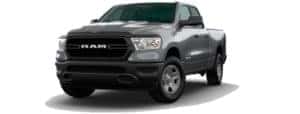 A silver 2020 Ram 1500 Tradesman is angled left on a white background.