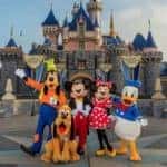 A fan favorite in Orange County, CA, Mickey Mouse and friends stand in front of the iconic Disney castle.
