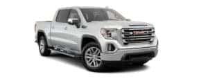 A silver 2020 GMC Sierra 1500 is facing right.