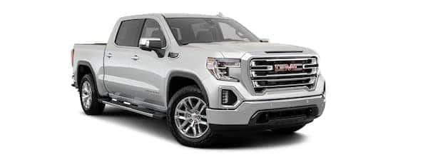 A silver 2020 GMC Sierra 1500 is facing right.