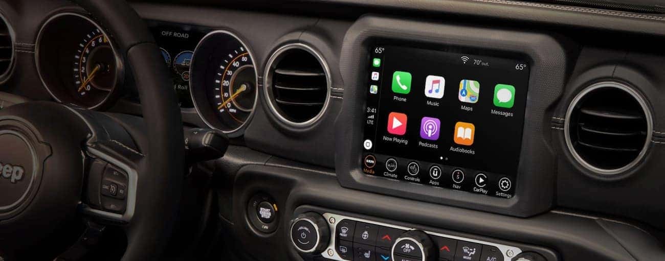 The infotainment screen in a 2020 Jeep Wrangler Unlimited is shown.