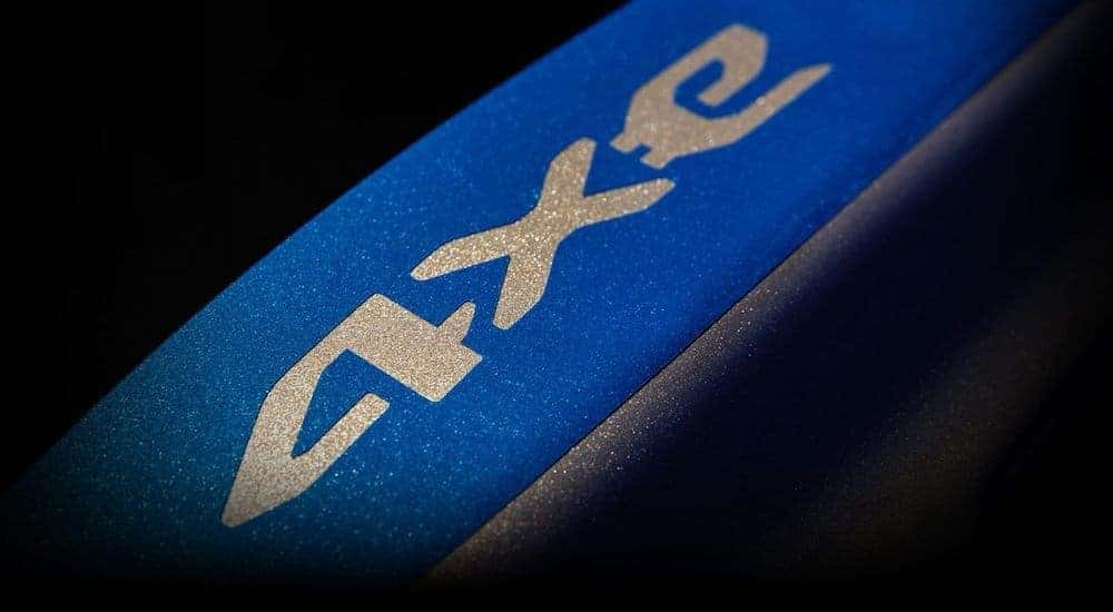 The blue and silver logo is shown for the Jeep Wrangler 4xe.