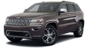 A grey 2021 Jeep Grand Cherokee is angled left.