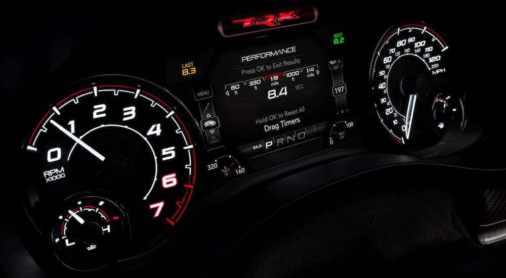 A close up shows the gauges and features on a 2021 Ram TRX.