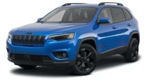 A blue 2021 Jeep Cherokee. is angled left.