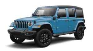 A blue 2021 Jeep Wrangler 4xe is angled left.