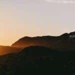 The Hollywood sign in Southern California is shown at sunset.
