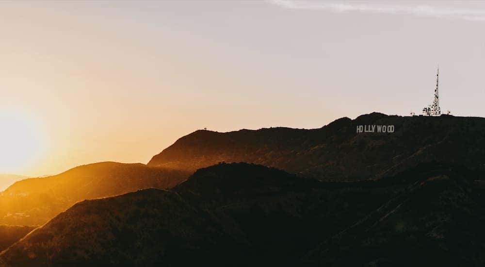 The Hollywood sign in Southern California is shown at sunset.