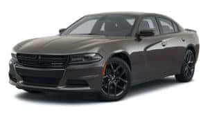 A dark grey 2021 Dodge Charger is angled left.