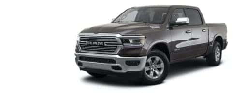 A grey 2021 Ram 1500 Laramie is angled left.