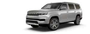 A silver 2022 Grand Wagoneer is angled left.